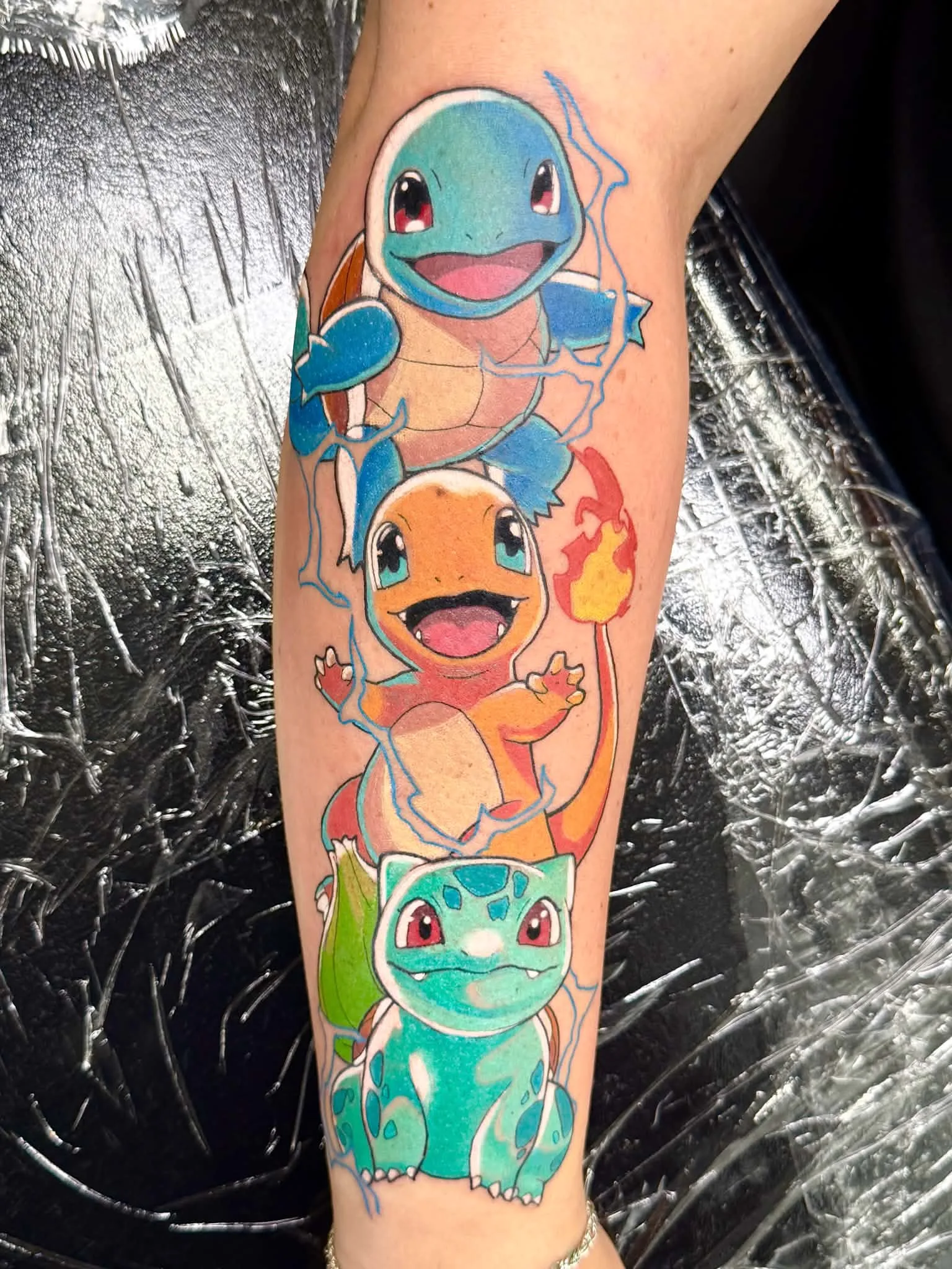Colour Pokemon starter trio tattoo of Squirtle, Charmander and Bulbasaur by Crouchy